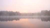 Pink sky with lake mist